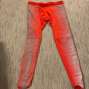 Nike reflective running tights.